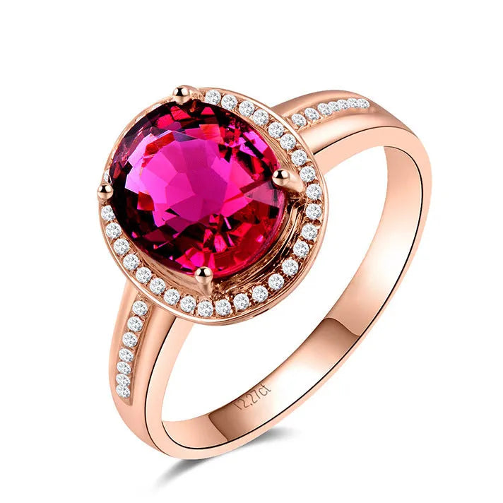 Geometric copper ring with gold-plated inlaid red crystal stones on rose gold adjustable band