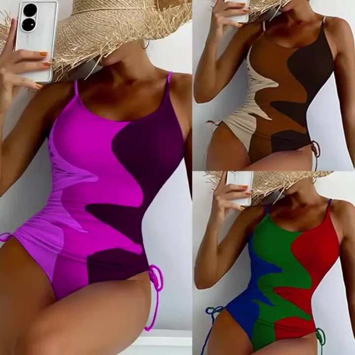 Women's blue sleeveless backless one-piece swimsuit with striped pattern on a mannequin