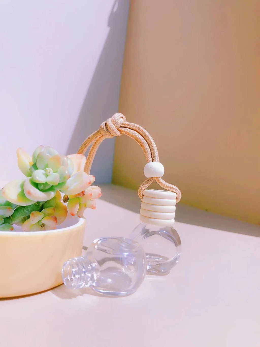 Glass car perfume pendant fragrance showing cylinder, diamond, flat drum and square container style options