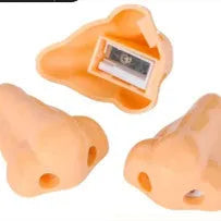 Flesh coloured plastic manual pencil sharpener with geometry shape and large nostril opening