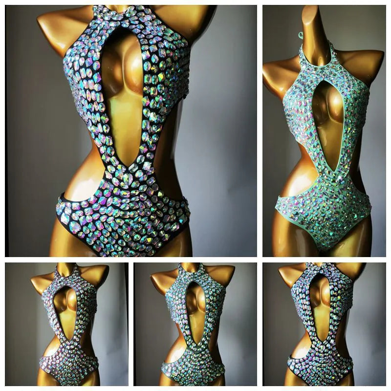Women's black mesh diamond one-piece swimsuit on a mannequin, showing the front design.