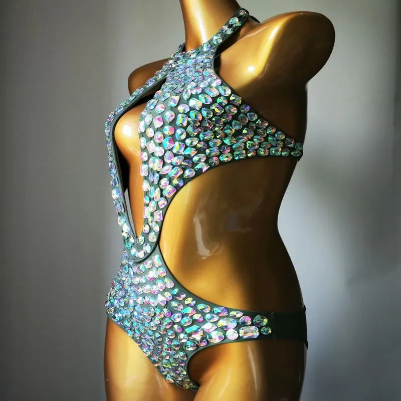 Women's black mesh diamond one-piece swimsuit on a mannequin, showing the front design.