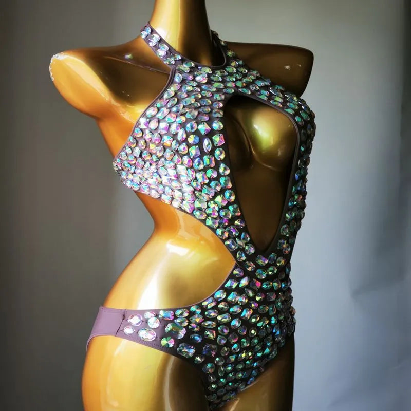 Women's black mesh diamond one-piece swimsuit on a mannequin, showing the front design.