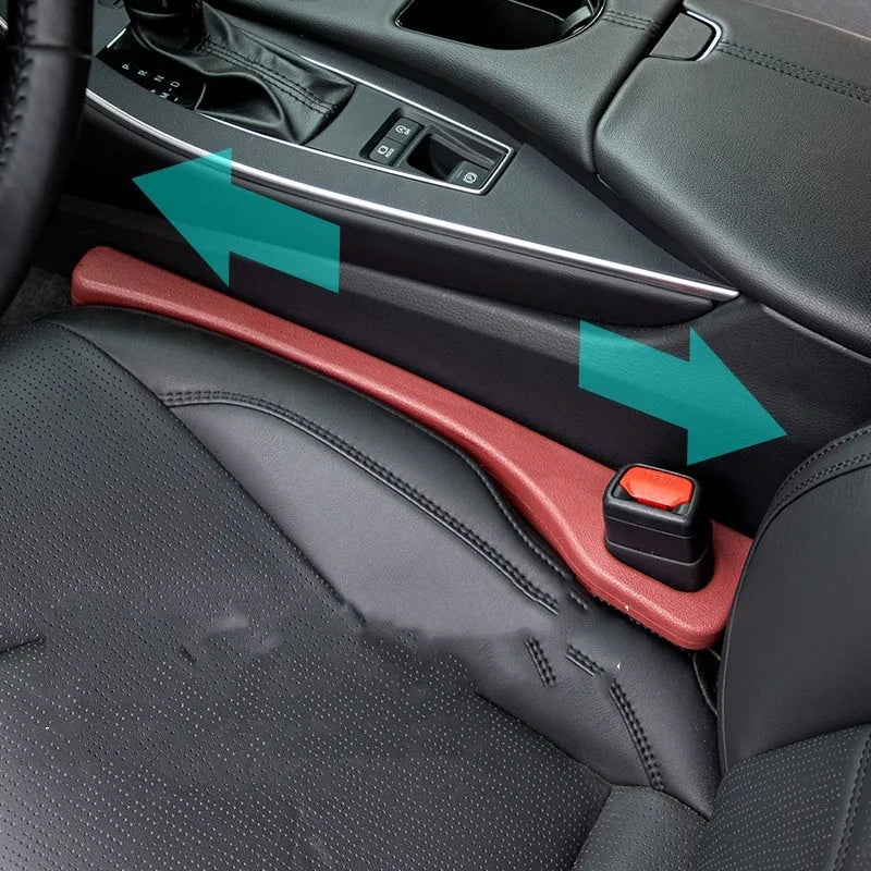 Two polyresin car seat gap sealing strips in chosen colour, showing integrated handle.