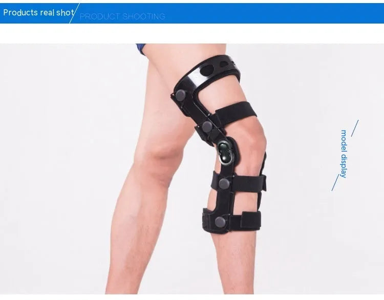 Black anterior ligament knee pad with iron stabilisers showing multi-layer construction