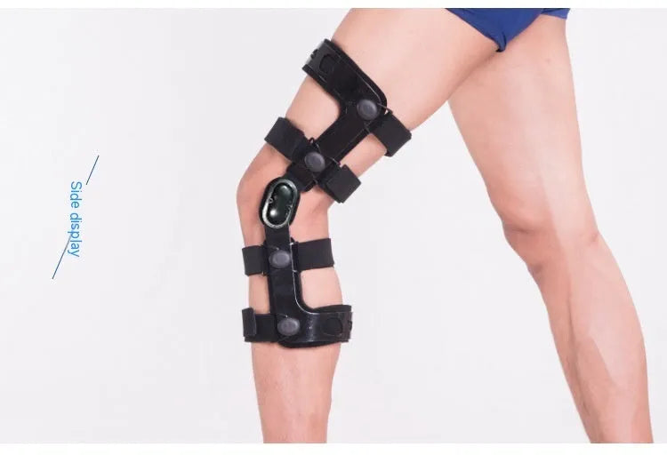 Black anterior ligament knee pad with iron stabilisers showing multi-layer construction