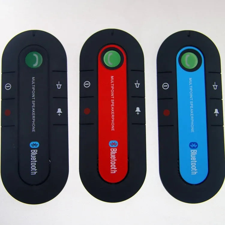 Car Bluetooth handsfree unit mounted on sun visor with charger and cable