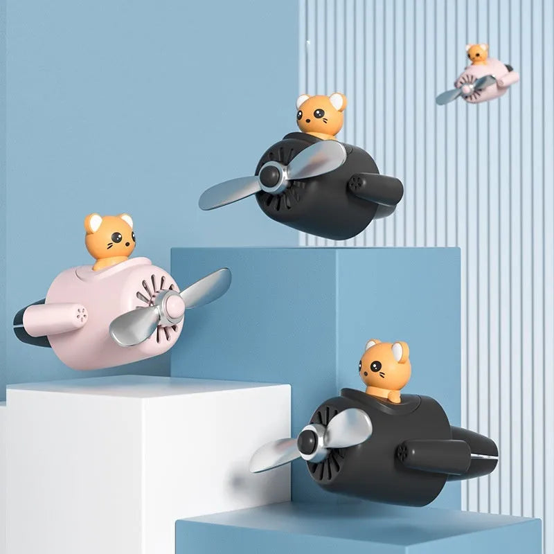 Cartoon-shaped plastic aeroplane car air vent diffuser in choice of colours with scented slices.