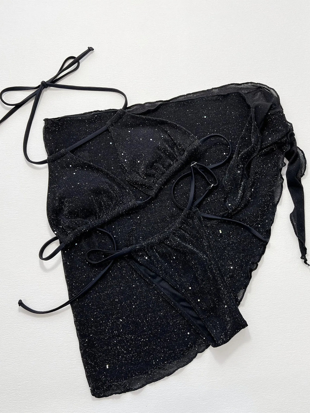 Black three-piece swimsuit bikini set with high-waisted shorts on mannequin