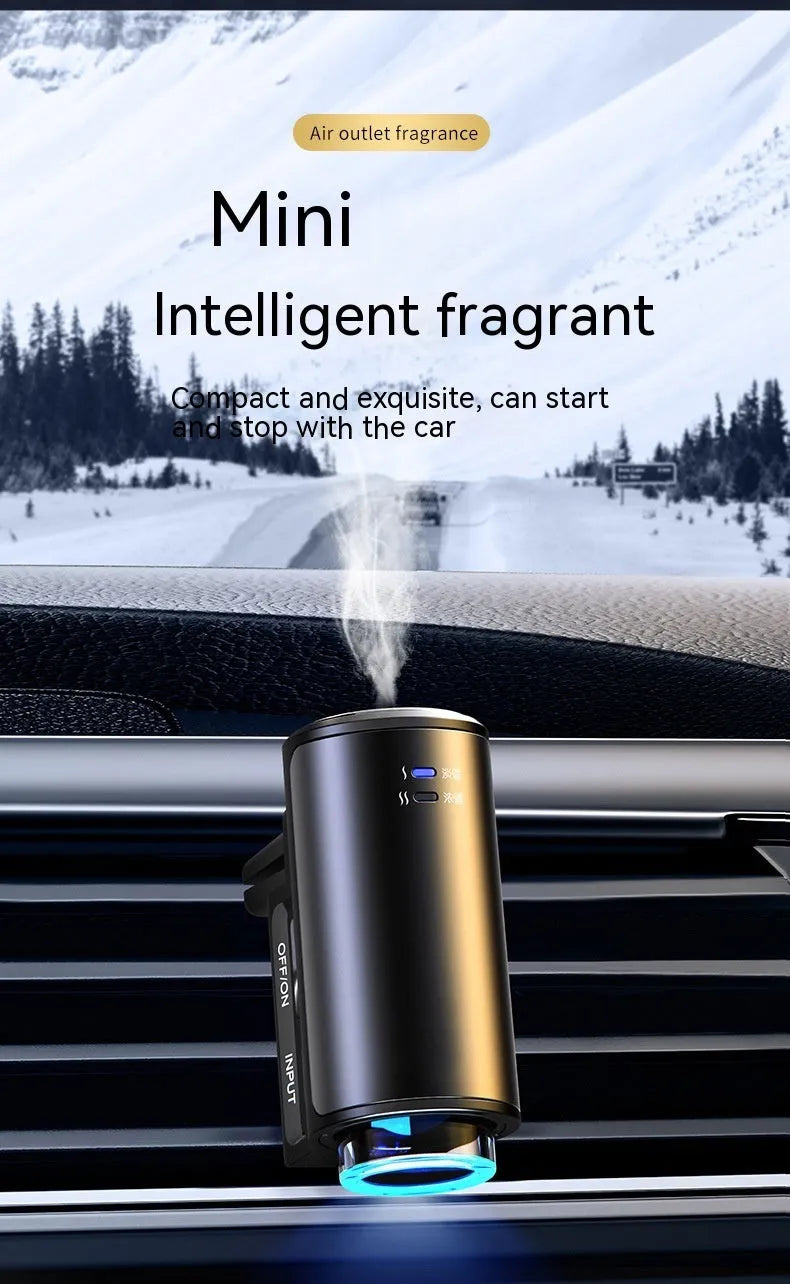 Obsidian black car vent clip aroma diffuser with essential oil bottle on a car air vent