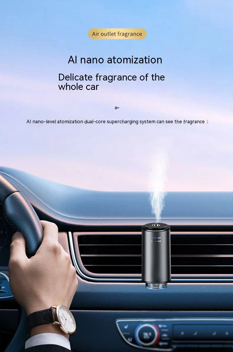 Obsidian black car vent clip aroma diffuser with essential oil bottle on a car air vent
