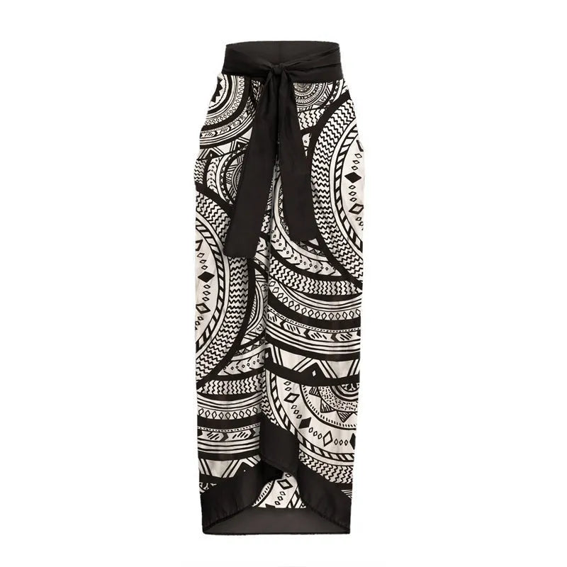 Women's vintage print one-piece swimsuit with deep V-neck and matching wrap skirt