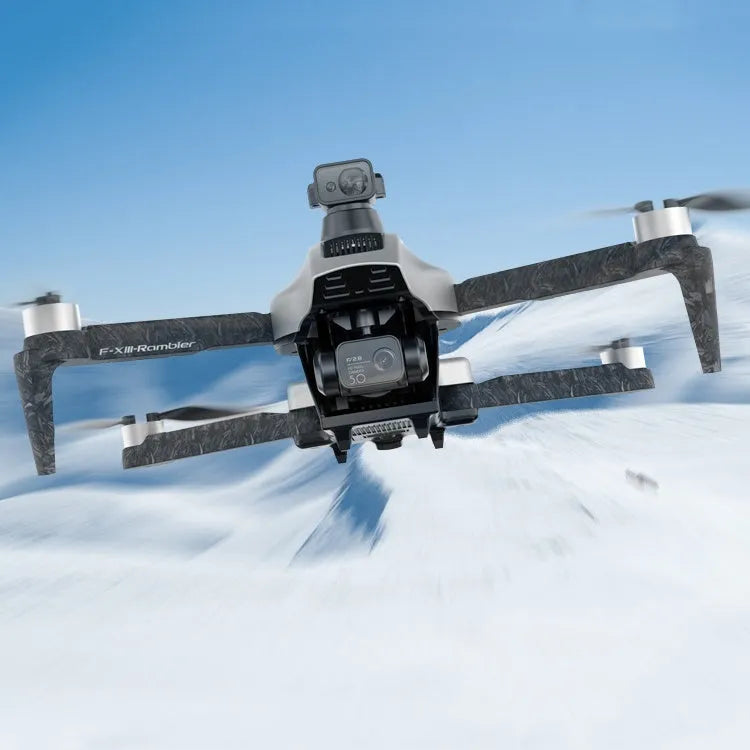 White folding quadcopter drone with camera and obstacle avoidance sensors on a remote control.