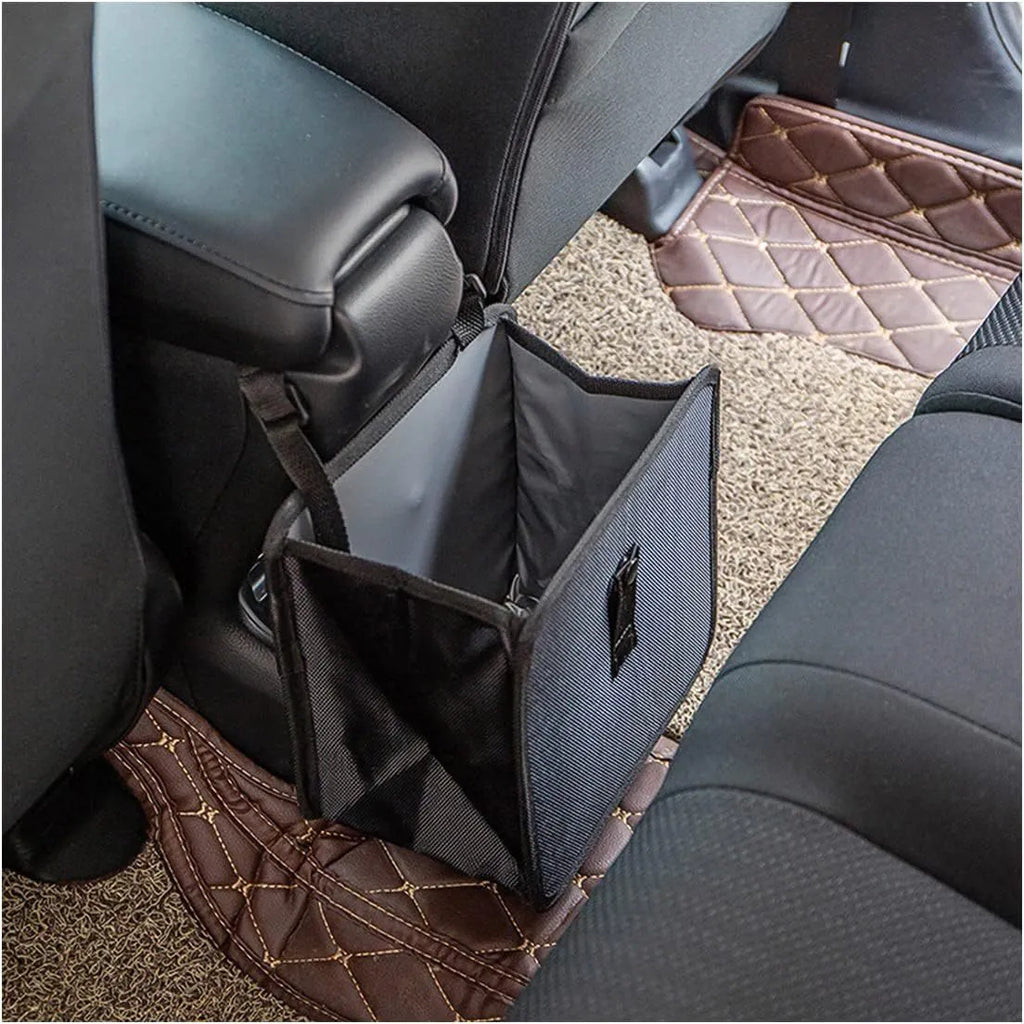 Black car folding trash can made from waterproof Oxford cloth, shown hanging
