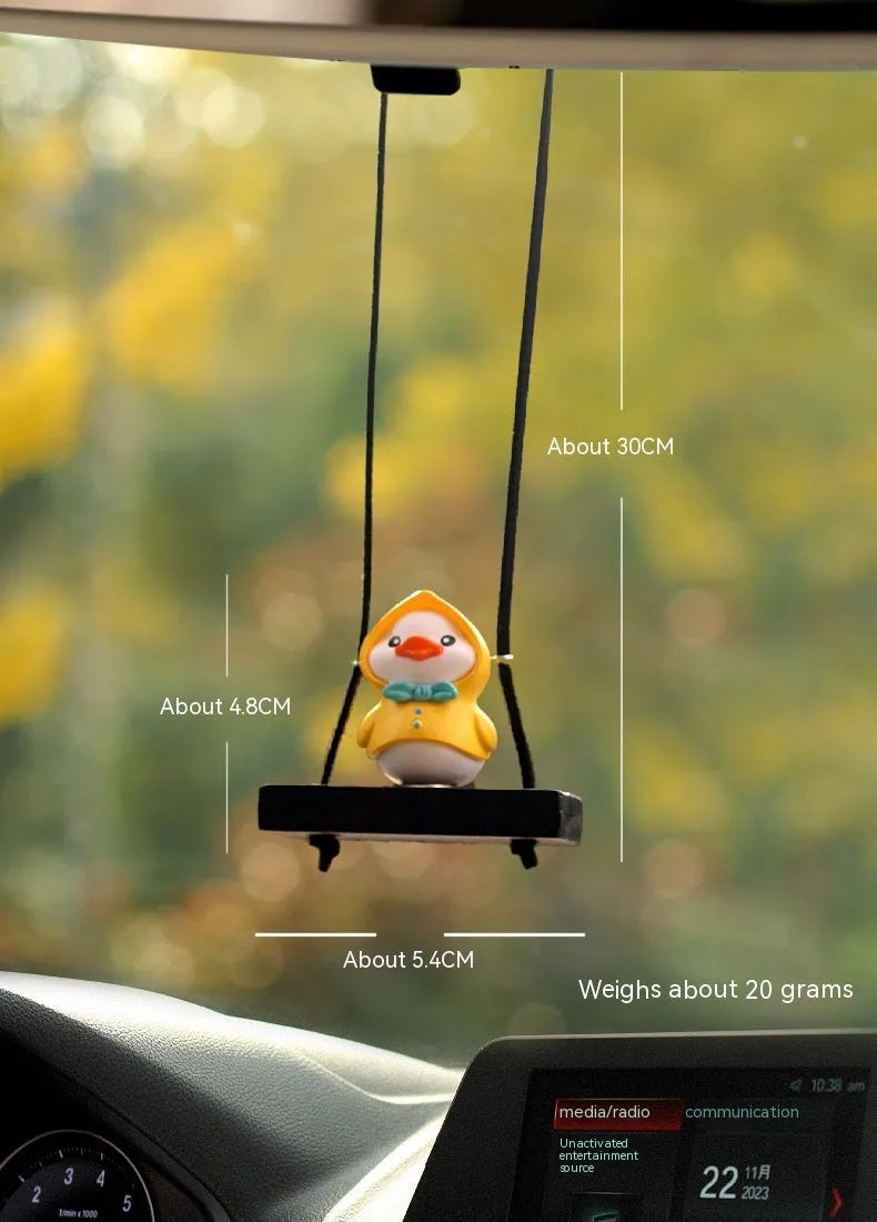 Yellow plastic duck doll car hanging ornament showing four style options: bath towel, swimming ring, bath bucket, and bow.