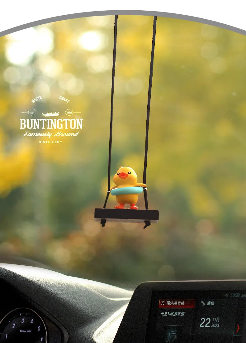 Yellow plastic duck doll car hanging ornament showing four style options: bath towel, swimming ring, bath bucket, and bow.