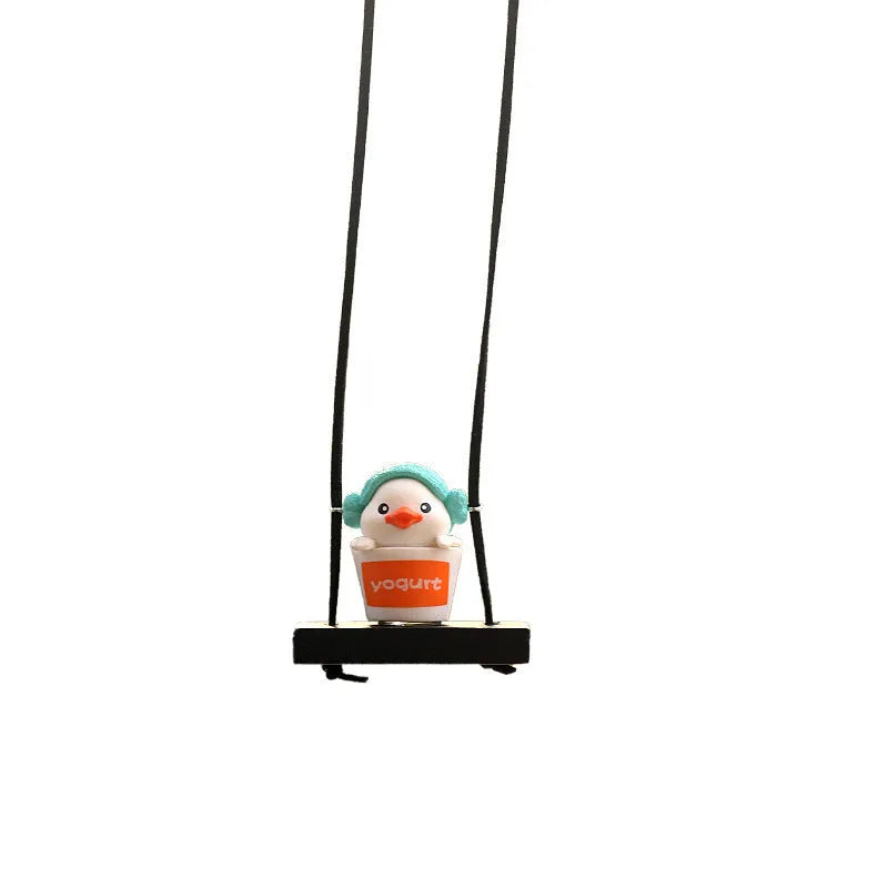 Yellow plastic duck doll car hanging ornament showing four style options: bath towel, swimming ring, bath bucket, and bow.