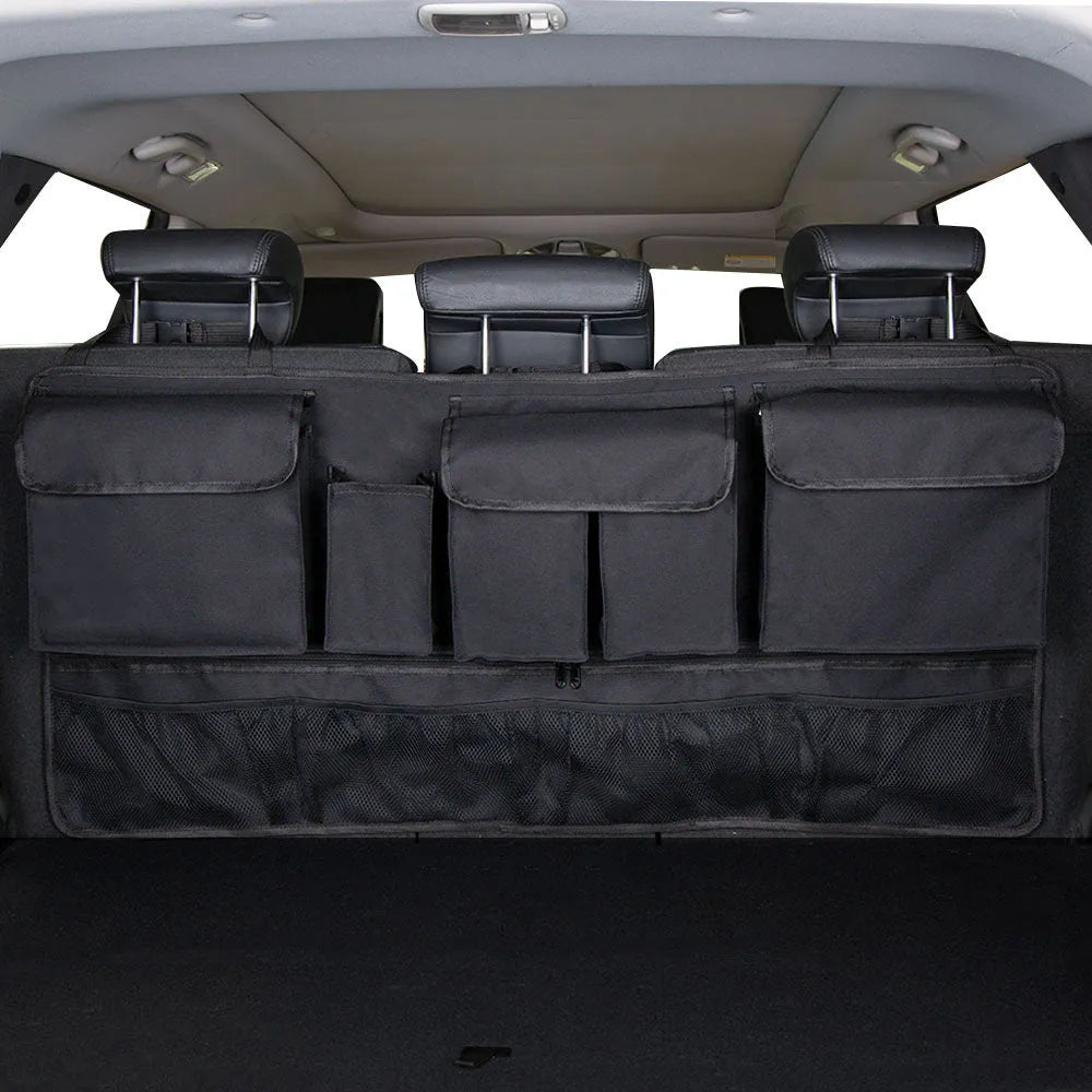 Black waterproof Oxford cloth car boot hanging storage bag with carry handle.