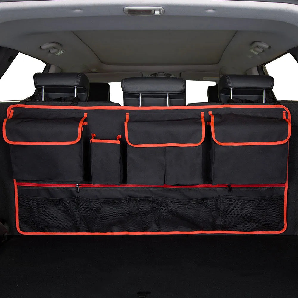 Black waterproof Oxford cloth car boot hanging storage bag with carry handle.