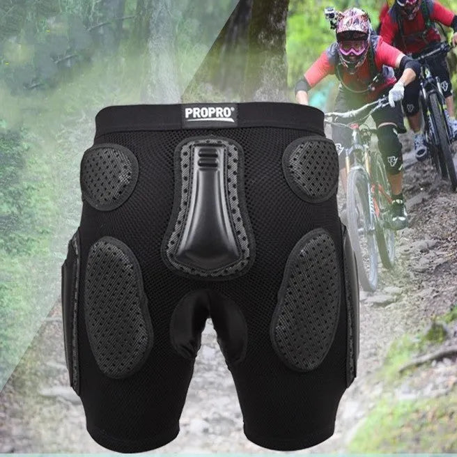 Black cycling protective hip pad pants shown flat, highlighting the integrated hip cushioning area.