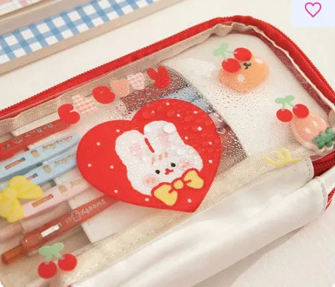 Transparent heart-shaped Japanese pen case with Korean style rabbit patterns in TPU material
