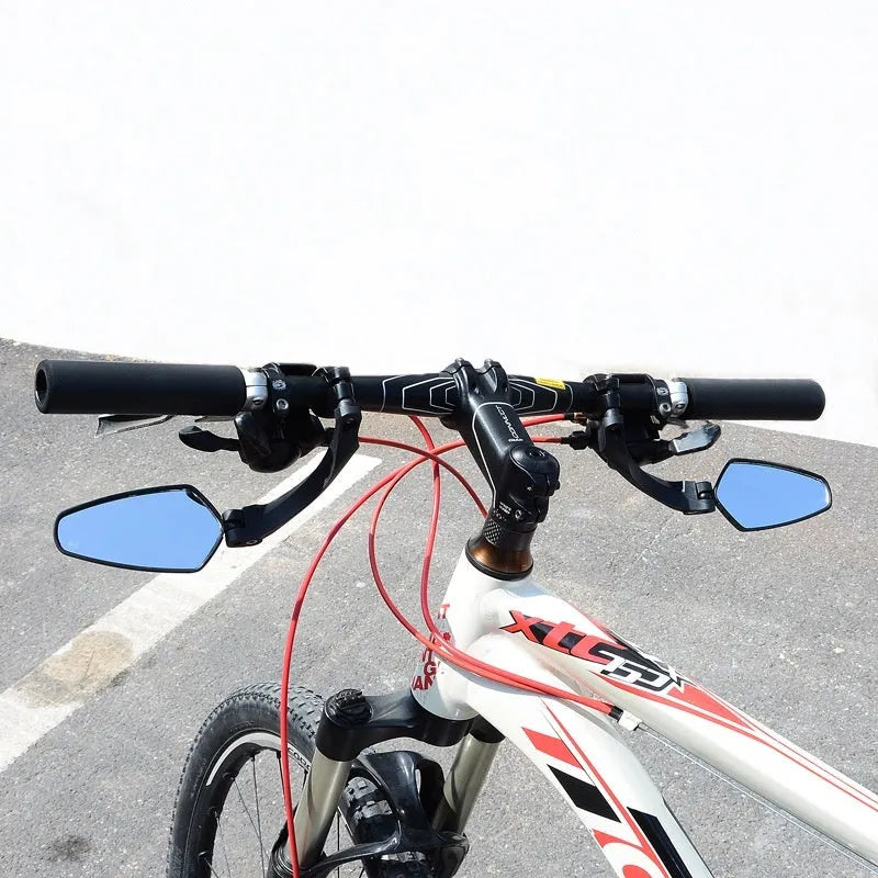 Black rotatable bicycle rearview mirror for handlebars, showing acrylic lens and mounting clamp.