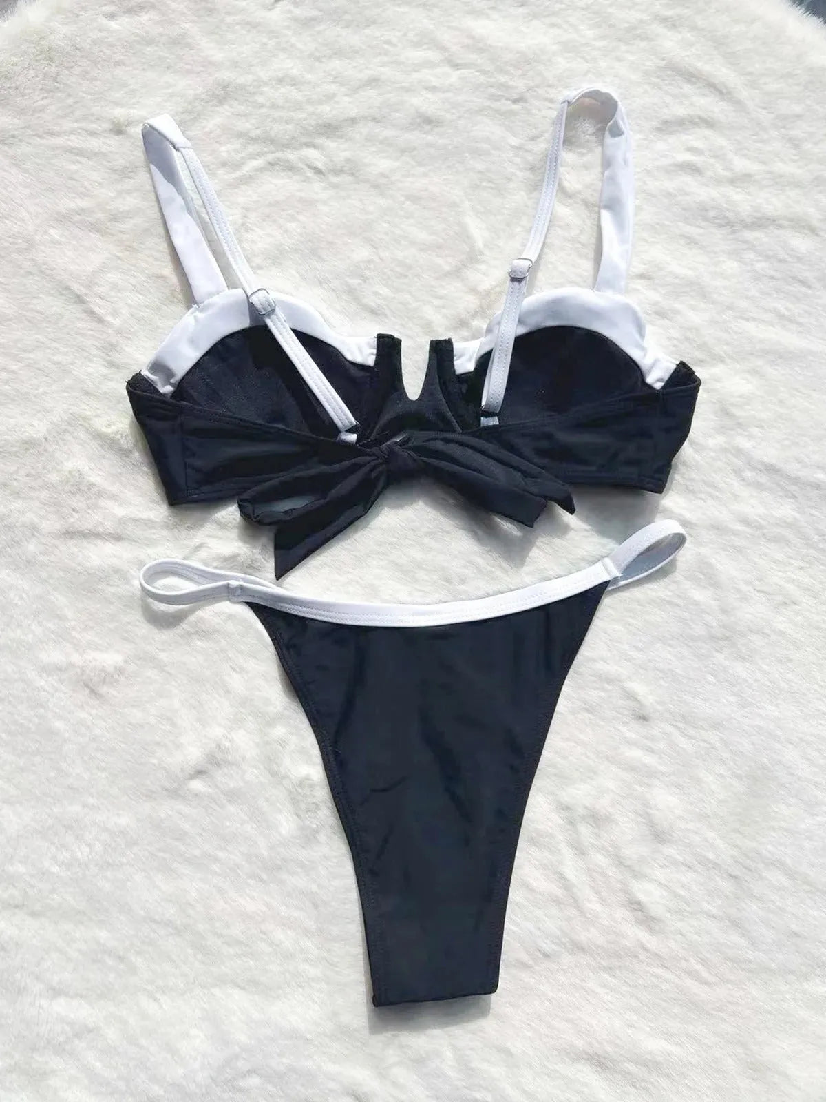 Black low waist women's bikini with stitching split design and brief style