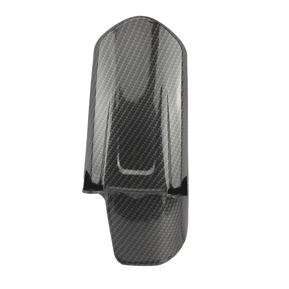 Carbon fibre rear shock absorber fender for a scrambling motorcycle.
