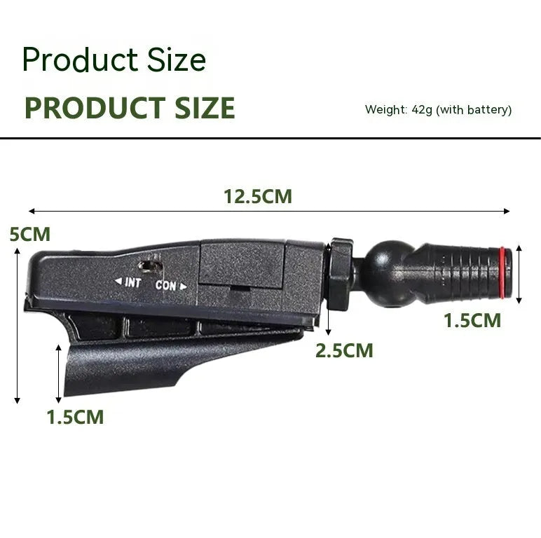 Golf putter laser aiming instrument on a putting green, showing laser alignment line.