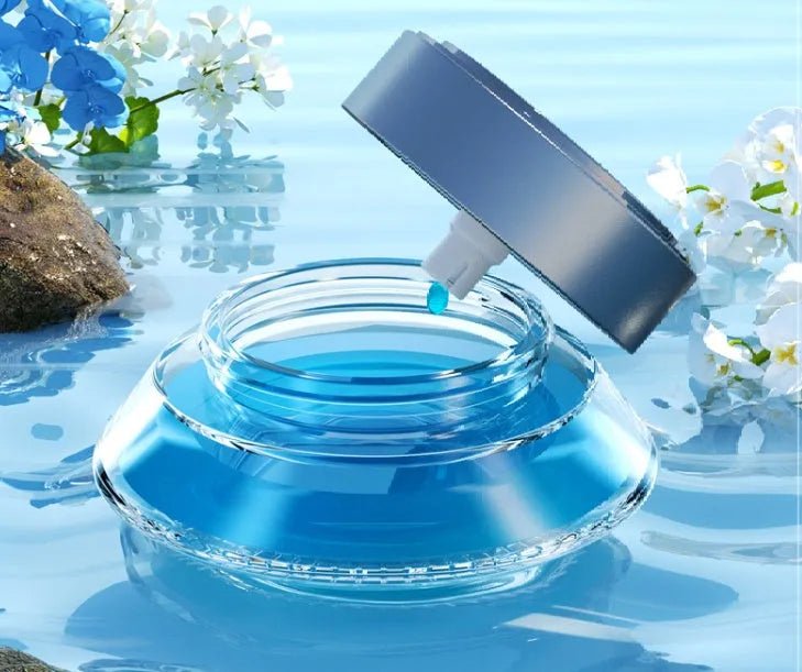 Smart spray car air freshener unit in Gentleman's Black or Qian Shan Cui colours with Ocean and Gulong fragrance refill bottles