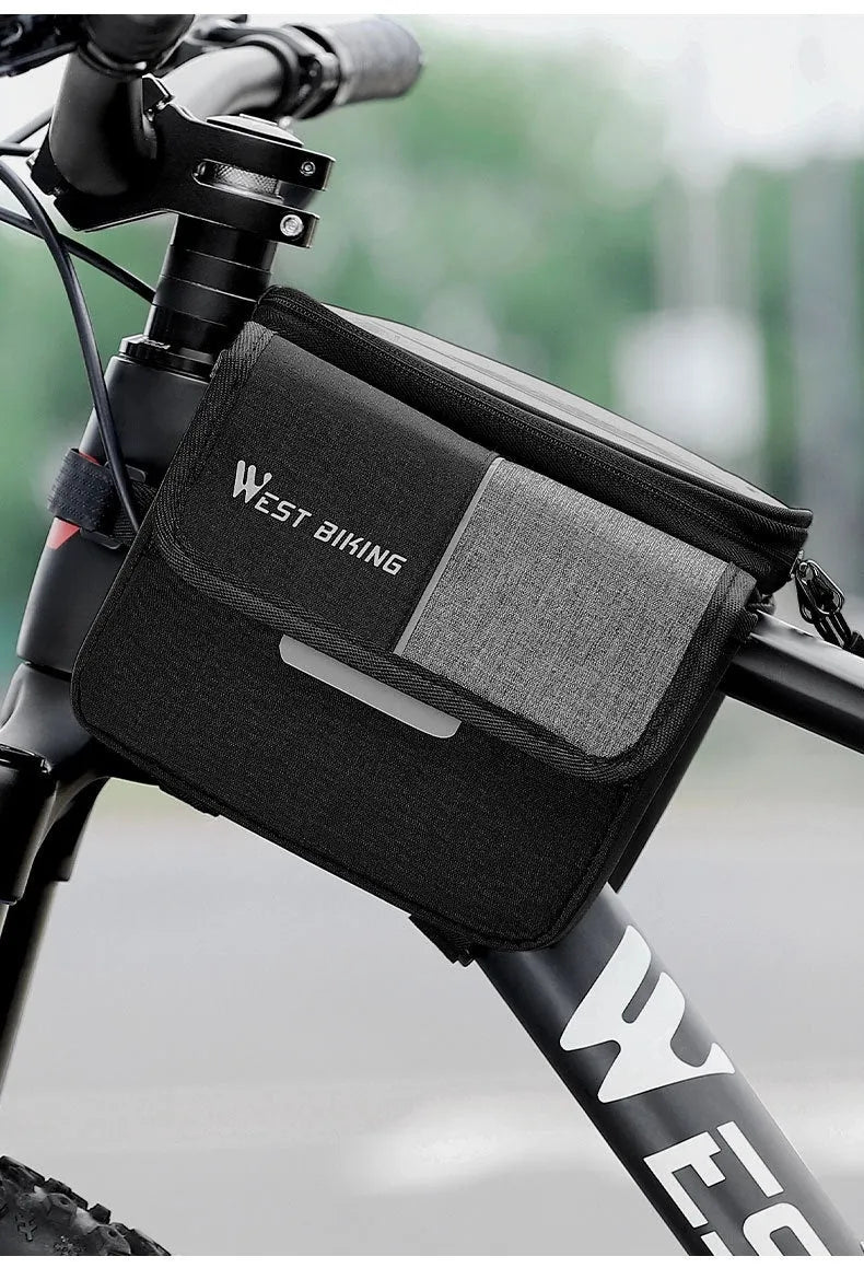 Black and grey Oxford cloth bilateral tube saddle bag mounted on bicycle handlebars.