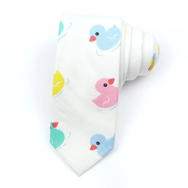 Narrow Korean style cotton bow tie with a printed cartoon pattern in various colours.