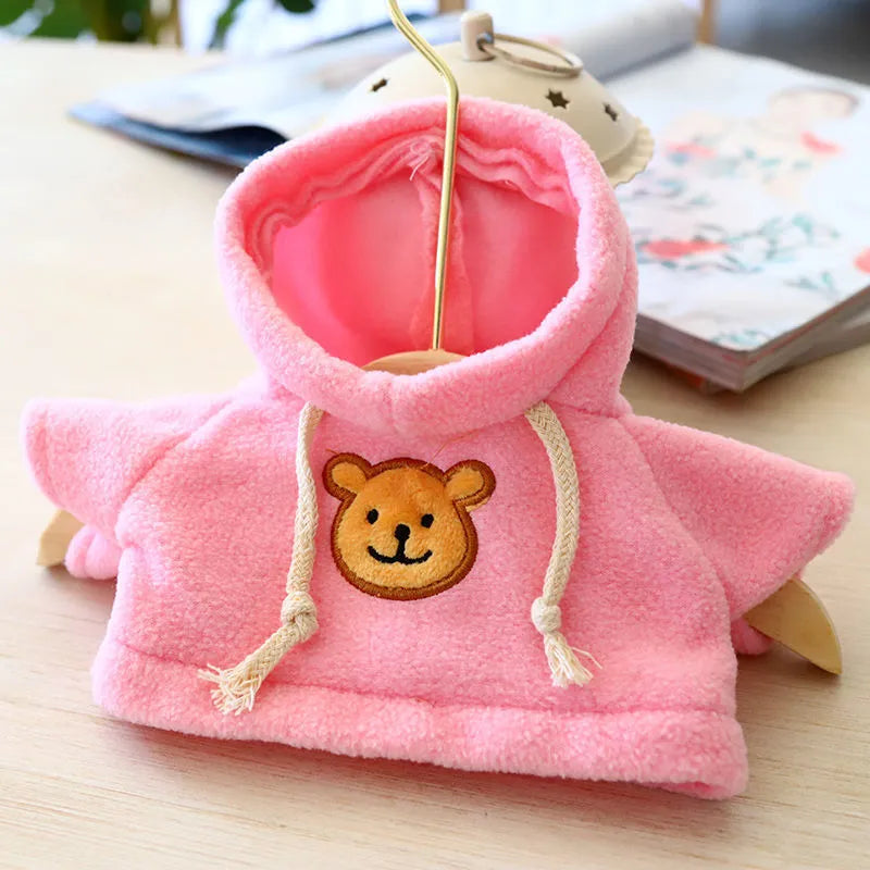 Blue balaclava-style dog hoodie made of soft cloth, shown on a model dog.