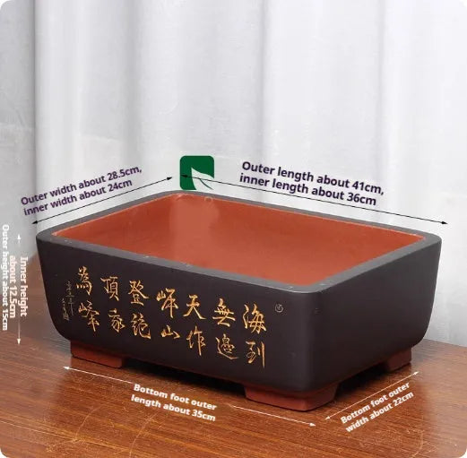 Purple clay Chinese style flower pot with plant on desktop, available in multiple colours and sizes