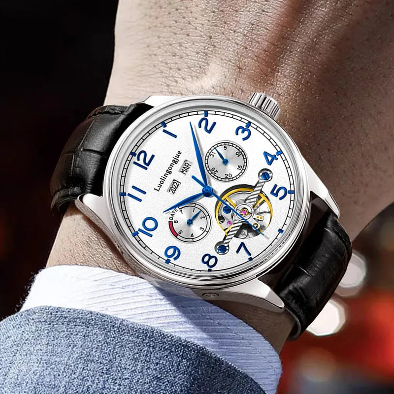 Men's stainless steel mechanical watch with sapphire crystal glass and leather strap on wrist