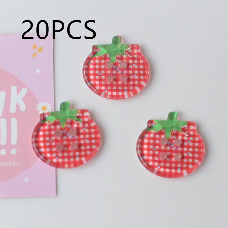Plastic tomato button ornaments in cherry tomato printing, red plaid, solid red, and mixed colour designs