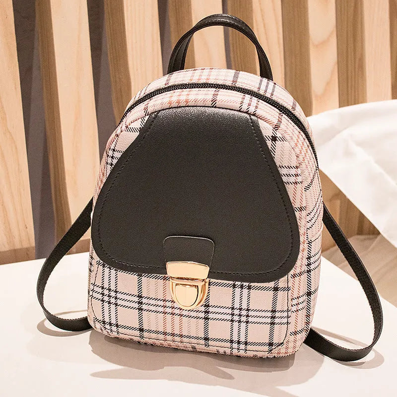 A diagonal one shoulder phone bag in synthetic PU leather, shown in a colour selection.