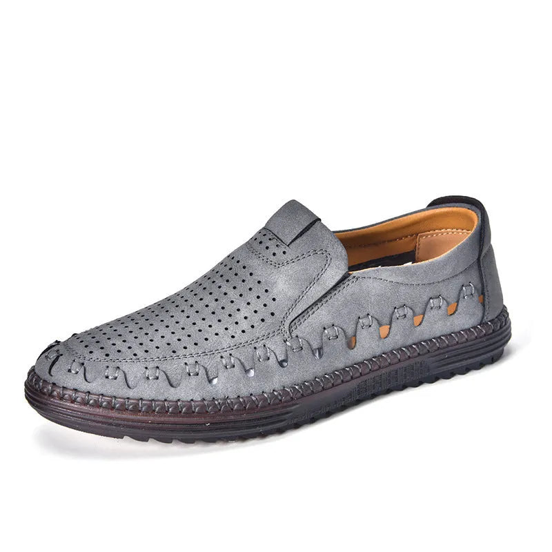 Men's brown slip-on casual shoes with round toe and hollowed-out pattern detailing