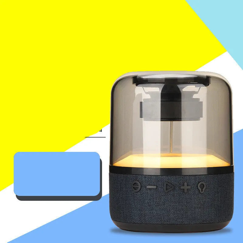 Four-colour light touch wireless Bluetooth speaker showing halo effect and control buttons.