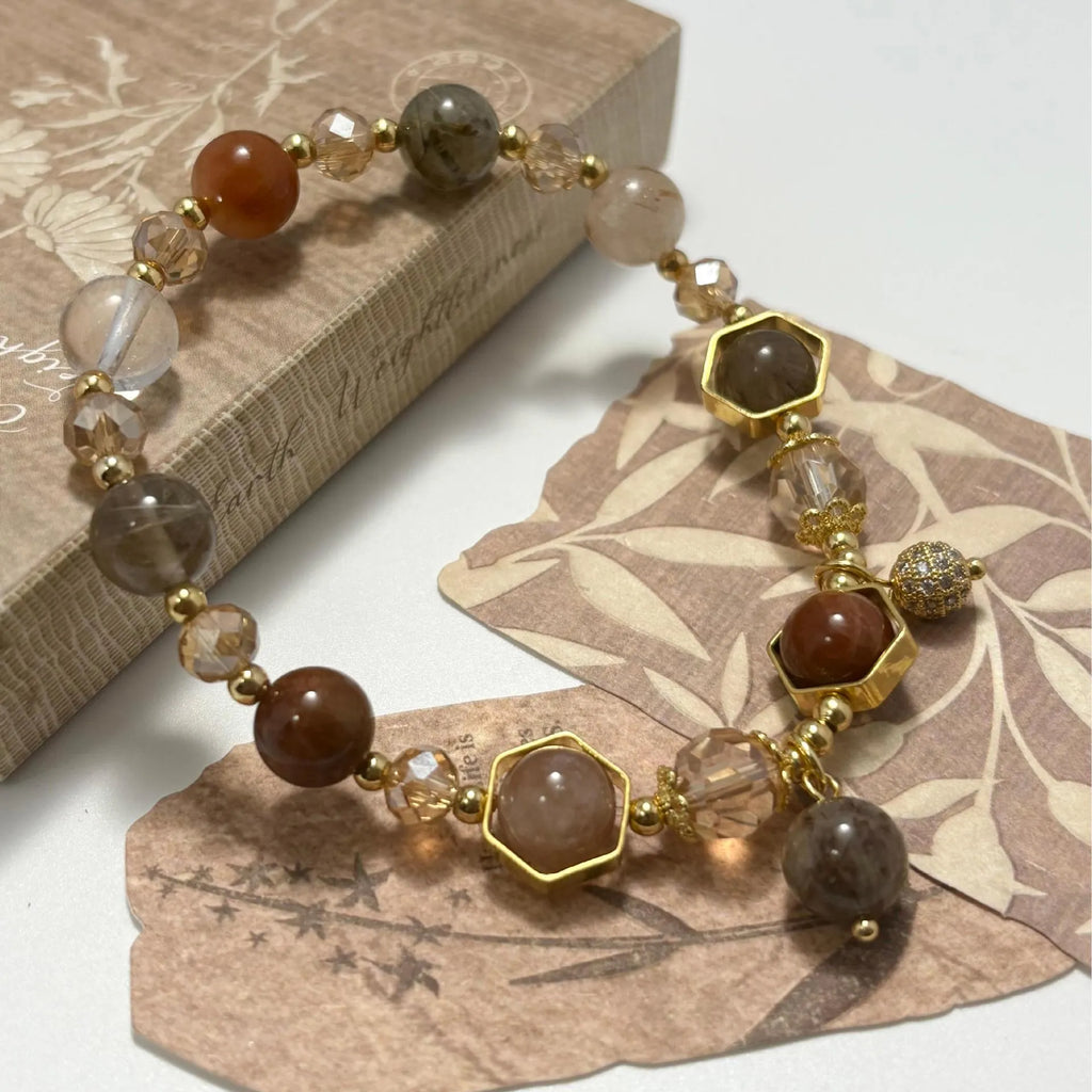 Gold citrine bracelet with hand-woven 8mm beads featuring Chinese auspicious charms