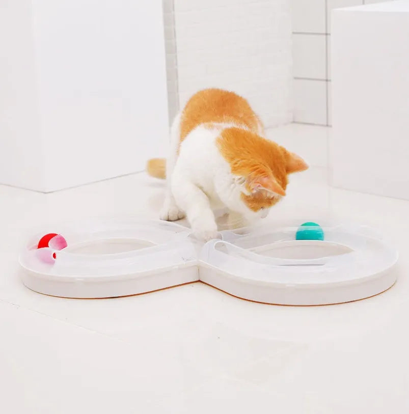 Cat toy turntable with interactive track ball dish, white and blue plastic, 50x24x5.5cm