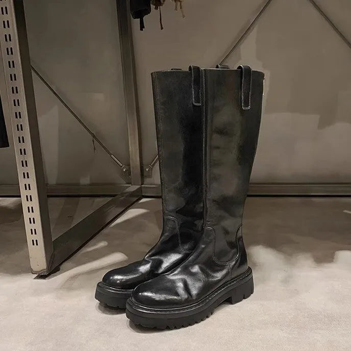Black round toe chunky heel knee high boots with back zipper fastening