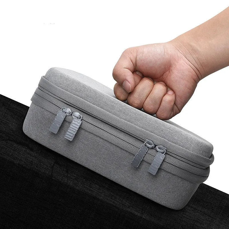 Simple modern EVA digital storage organiser bag for headphones and cables, shown in black or grey.