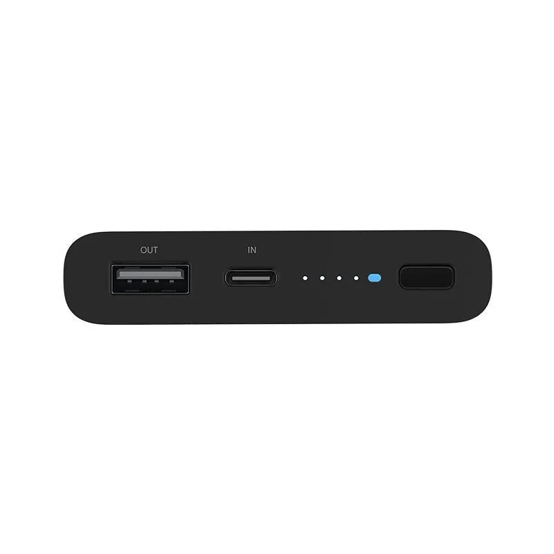 White and black 10000mAh power bank with USB-C port and wireless charging surface
