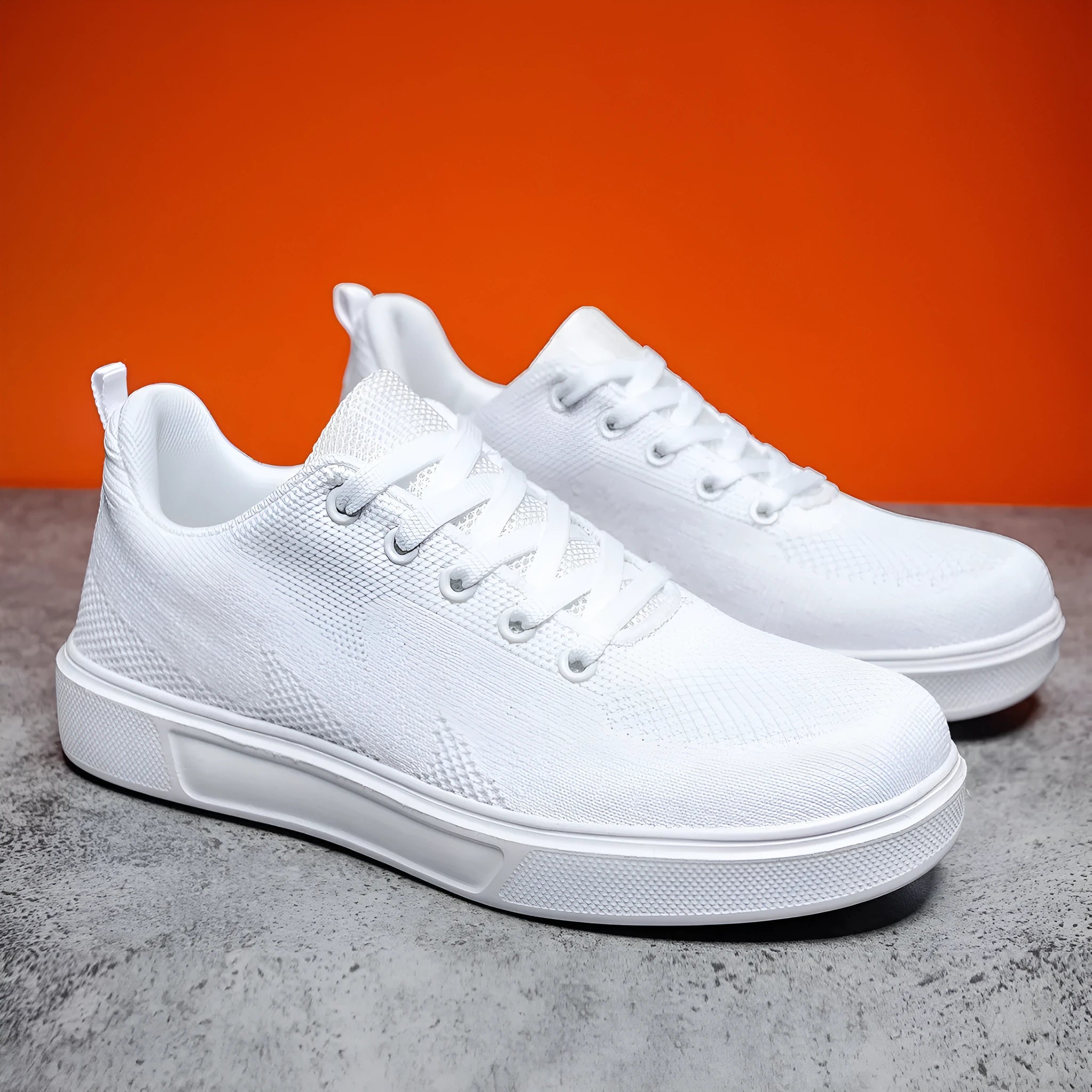 Light white and black unisex casual board shoes with mesh upper and thick EVA sole.