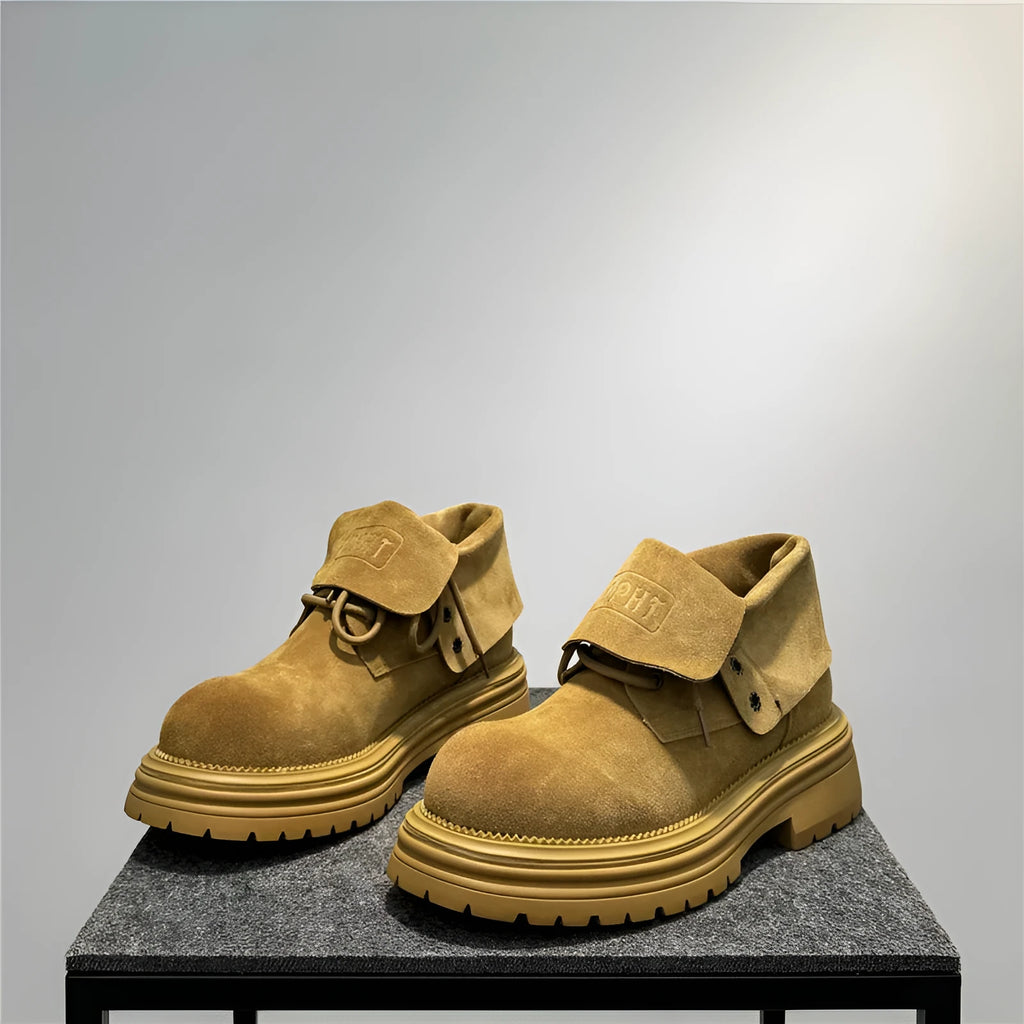 Retro distressed worker boots in cow suede with thick soles and low tube sock length