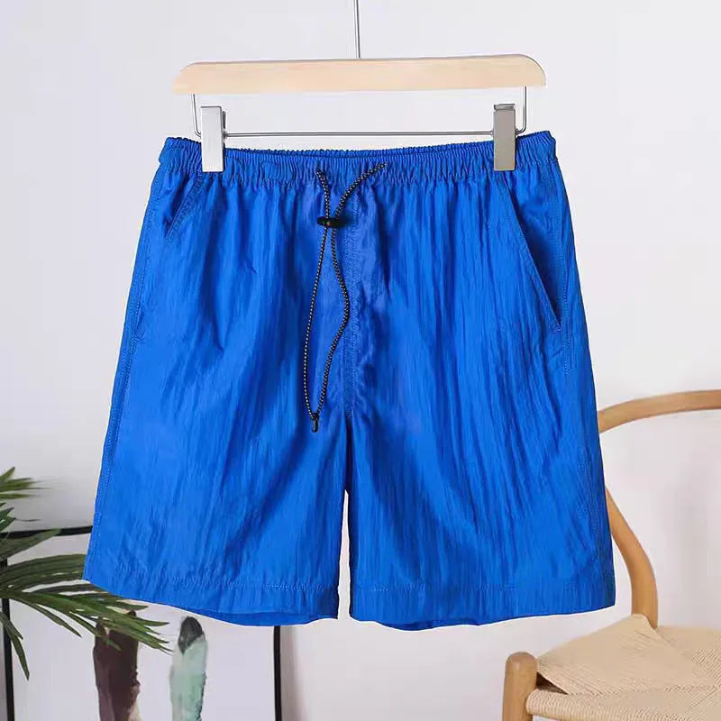 Men's straight cut polyester sports shorts in army green, black, blue, or gray colours