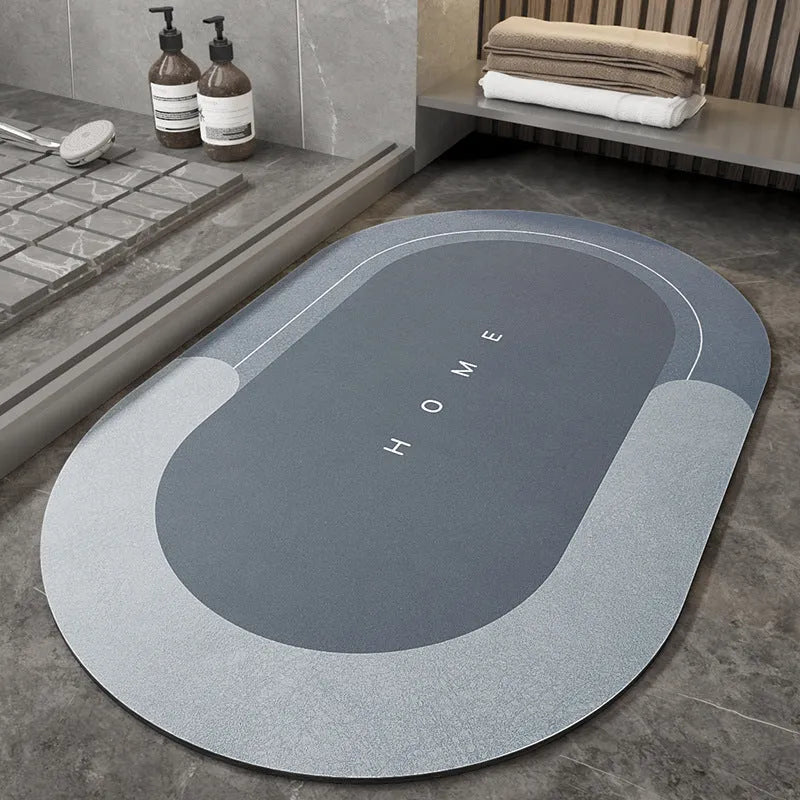 Blended fabric bathroom floor mat in blue, available in oval and rectangular shapes.