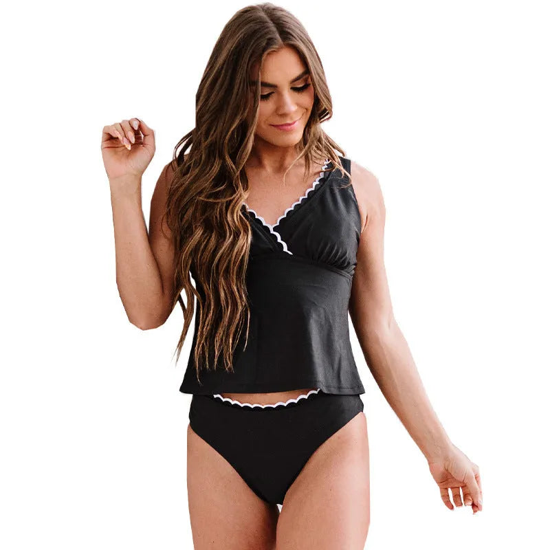 Black women's swimsuit with split-style design on mannequin