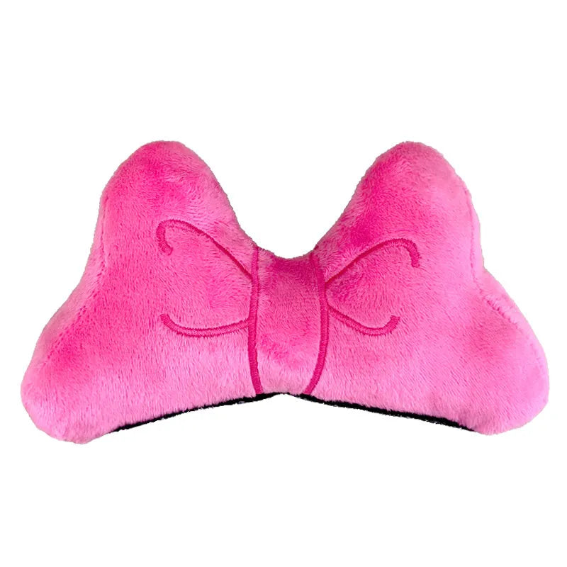 Soft plush hair-tie bow decoration for helmets in red, peach pink and rose pink.
